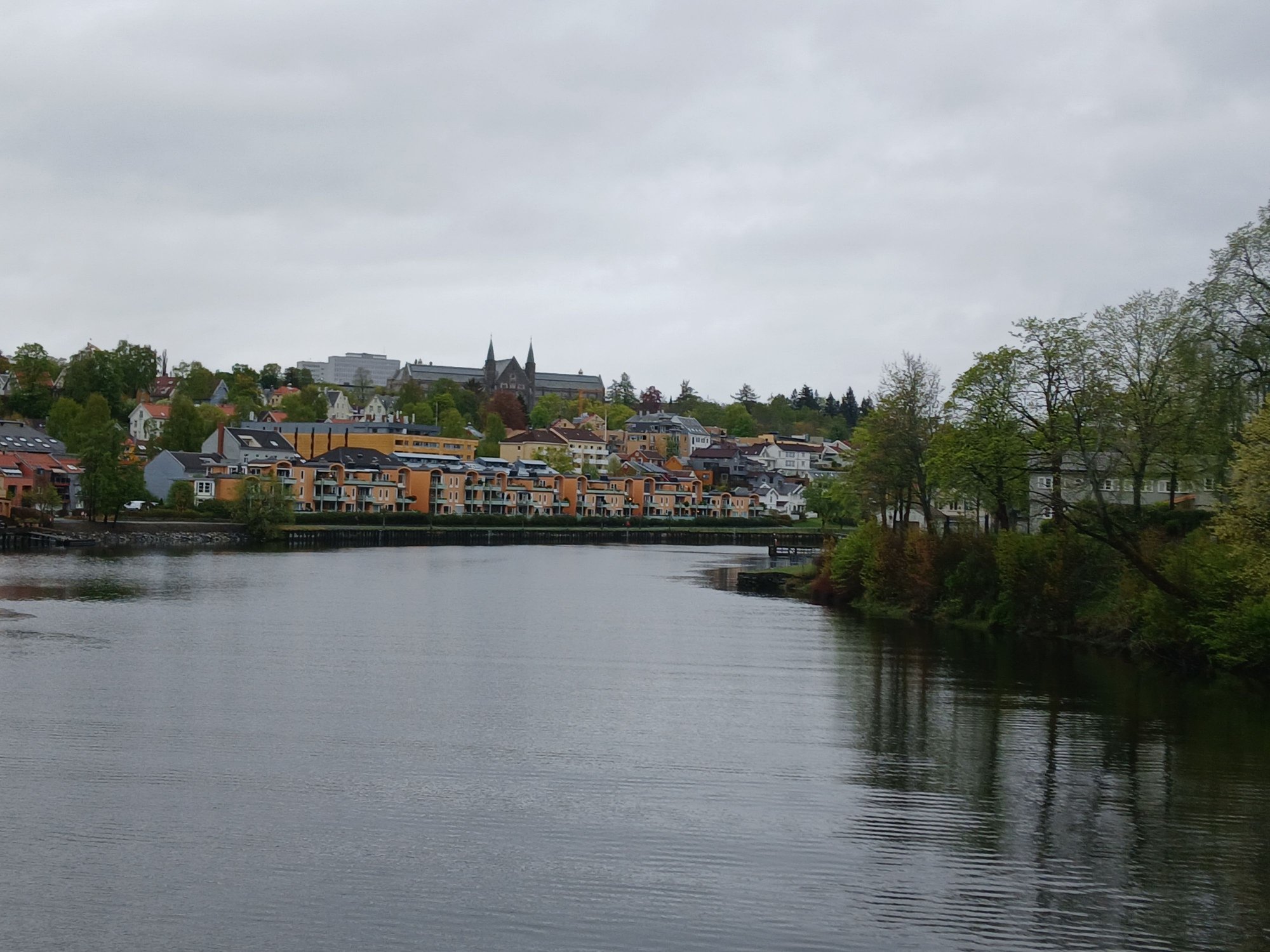 View facing the other side of the bridge, Nidaros Cathedral spires rising along the skyline