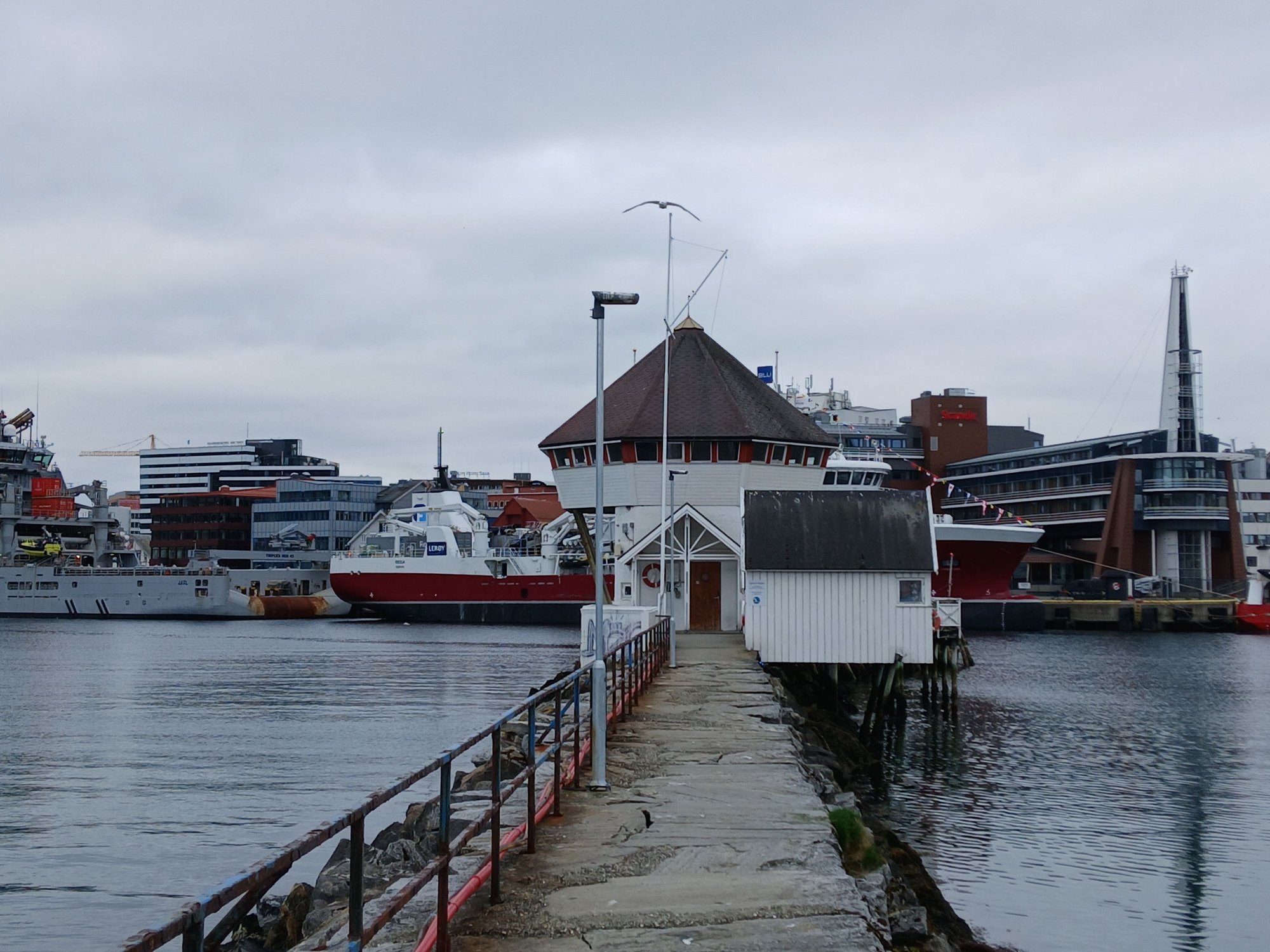 By the small harbour, with the boats