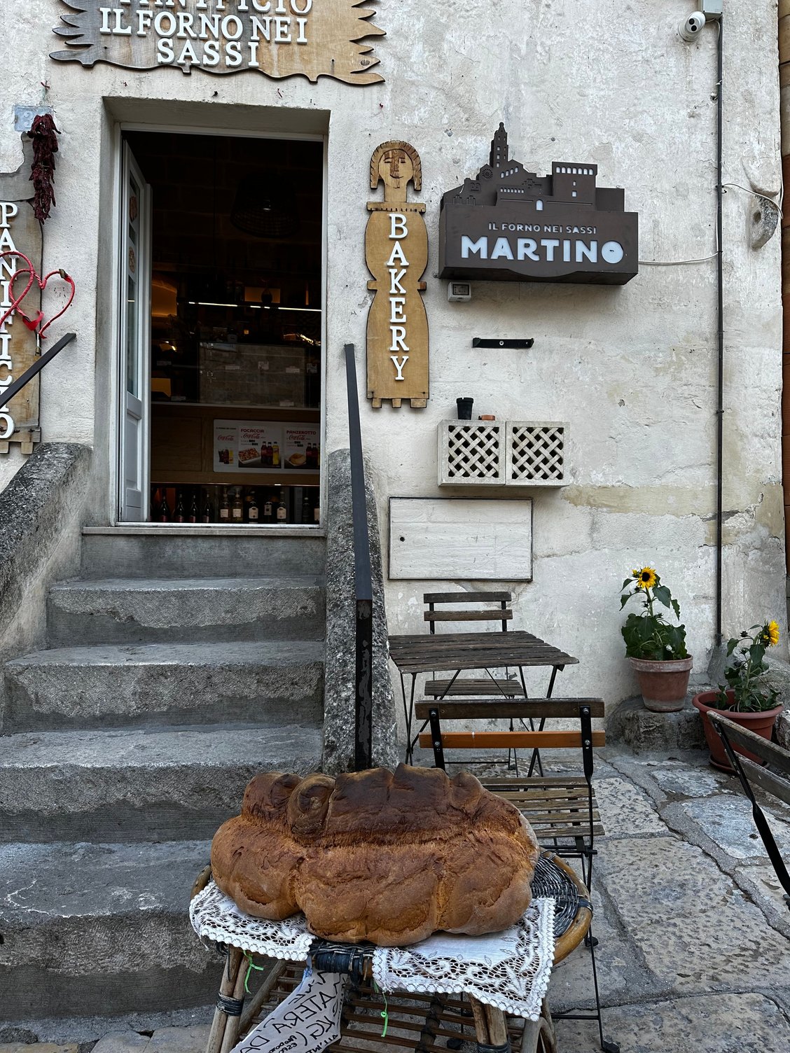 The legendary pane di Matera on view outside a bakery....I once brought an entire loaf home with me, in a carry-on devoted only to bread and taralli...