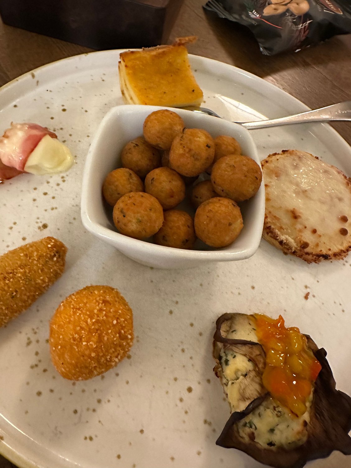 On the second platter, in the center: Addictive