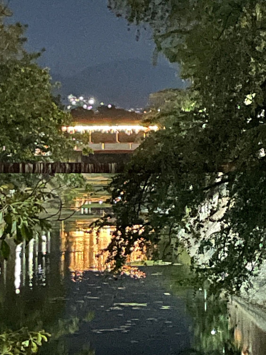 This is a great shot, I saw that because the canal is not the most lovely looking waterway, but I caught it lit up and reflected.  I like it