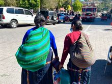 Mayan women leaving the market.