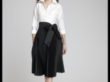 This is what I would probably wear to a semi formal wedding in a rustic setting.  It’s very dressy fabric used in a more relaxed style.  This or some variation of it comes in a ballerina length skirt.  Cute flats for the rustic outside part of the wedding, if there is one.  

The dress you posted is very pretty but says after six wedding at the Plaza instead of rustic-ish Kennebunkport  wedding. 