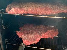 The flat brisket on top and a burnt ends to be on the bottom go into the smoker at 225° with oak and hickory chips providing the smoke.