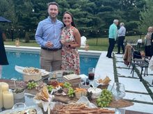 Posing in front of the charcuterie board. 