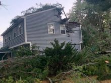 Storm damage to house around the corner. 