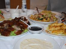 Peking duck (first of two courses) and salt and pepper squid (a family favorite)