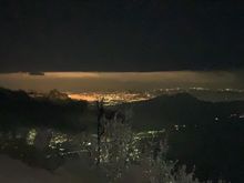 The lights of Guatemala City in the distance from base camp on Acatenango.