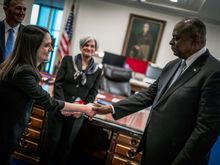 Daughter w/boss and proud mom and dad.