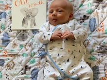 My grandson last week at one month. My sister made his comfy quilt.