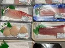 Packages of sashimi-grade dish from the Japanese fish market. I sliced them at home. 