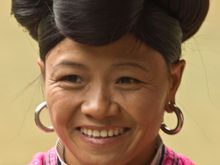 Their ritual for tourists is to unravel their very long hair, then comb through it. We enjoyed chatting with them.