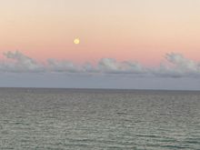 Sunset and moon over Atlantic Ocean, taken 5 minutes ago from our apartment on Miami Beach.