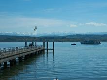 Jetty of Vallamand, close to Avenches beach, with Neuchatel bound boat
