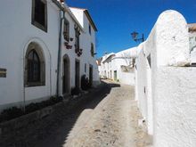 A typical Marvão whitewashed street leading to the castle