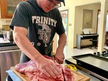 The 30-year-old preparing to trim and separate the 18 pound brisket for Saturday night’s dinner. I helped.