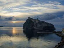 'Beautiful' is a tired word, but the view from our rental apartment's patio was world-class. We chose it by design. Seen here, Ischia's iconic Aragonese castle. From here on, we'll refer to Ischia Ponte as simply 'Ponte'. As in 'bridge', like the one shown above linking the village with its castle. For many centuries, that bridge has been an umbilical cord of sorts.
