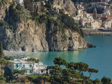 Loren's aforementioned mansion with Amalfi in the background. Her estate also includes a perched chapel out at the tip of her promontory, just to the right of those descending trees. 