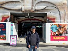 Ed in front of the creepy clown entrance to Luna Park