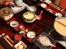 Breakfast: tomato juice, small whole river fish we grilled ourselves, soup with noodles and vegetables, miso soup, sticky rice with miso, pickles, fresh soft tofu, egg cooked in hot spring water, cantaloupe. 