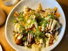 We shared these smashed potatoes. Twice fried Yukon gold potatoes, house Napa cabbage kimchi, aioli of house green sriracha, scallions and crispy braised pork belly.