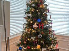 xmas tree 2025, with ornaments collected from our travels