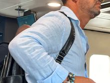 Dapper Italian fellow-traveler.....it's not only the haircuts, it all the rest--the hats, the glasses, the fit of the clothing, etc etc.....!!