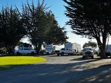 Our campsite includes bbq, table chairs and fire pit.  We also have a beautiful view of the ocean.