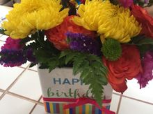 Take a look at these flowers.  They look so weird.  I upgraded to "Best" for a fuller arrangement and they extend several inches off to the right but not on the left.  They aren't as tall/ high was the "best" arrangements.  The aunt was happy with them and the flowers in them WERE pretty, but it's oddly shaped and not what I think I ordered.  Thoughts?