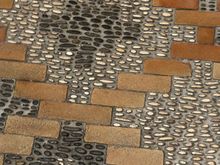 Stone and brickiest into cement (?). The first thing that struck me as I entered the hotel for the first time.