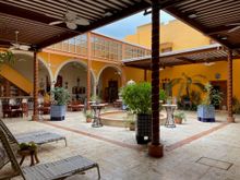 The bedrooms are aligned around this courtyard