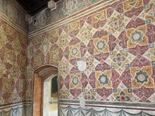 I love these walls painted with colorful geometric designs