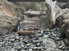 Side view of the bridge.  There is actually a rope to help you get down the rocks from the bridge.