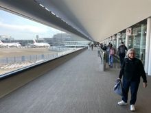 Really nice long window as you walk down the hallway to customs