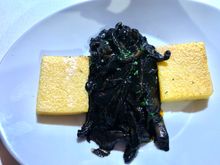 Cuttlefish in a black sauce with polenta for dinner 