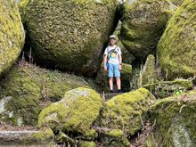 My son among the huge boulders up on Penha