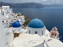 Classic white-washed buildings with blue domes!