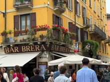 Street scene in the Brera District. I love the color of this building.
