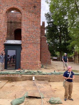 historic Jamestowne archeological tour with church tower in the back
