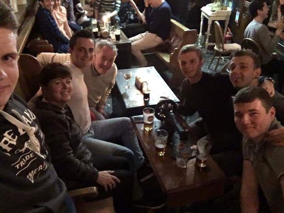 I picked up some cute French guys in an Irish pub.  My wine glass is missing so I must have been cut off by then.  DH, in the silver hair, also enjoyed the evening.  I think I invited them to NY.