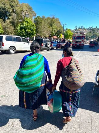Mayan women leaving the market.