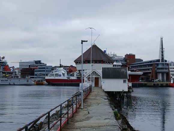 By the small harbour, with the boats
