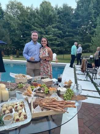 Posing in front of the charcuterie board. 