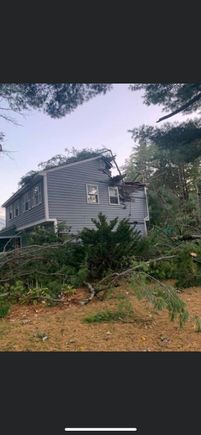 Storm damage to house around the corner. 