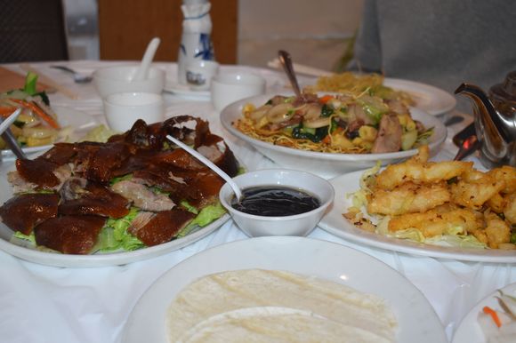 Peking duck (first of two courses) and salt and pepper squid (a family favorite)