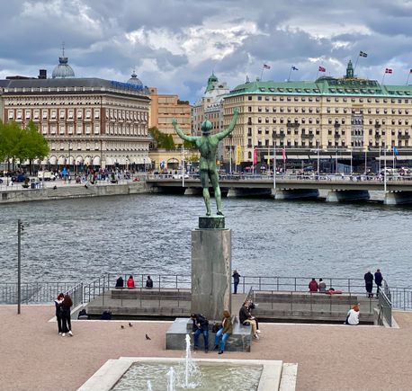 Norrmalm from Strömparterren Park with Sun Singer statue in foreground 