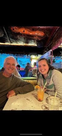 My dad and niece with a mermaid behind them. My dad is doing better. Still gets tired easily. 