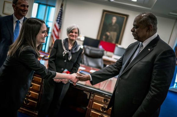 Daughter w/boss and proud mom and dad.