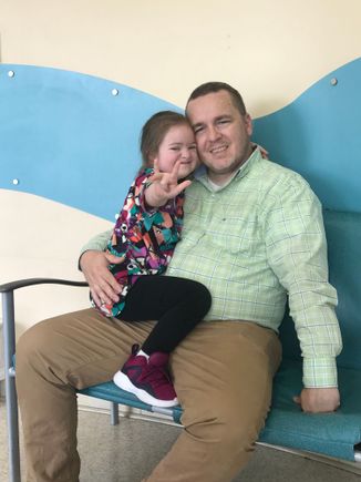 Violet signing I Love You before her MRI