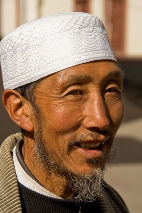 Songpan's old town, Songzhou, has an interesting mix of people, including Han, Tibetans and Buddhists. There are also Hui Muslims, like this town muezzin shown here.